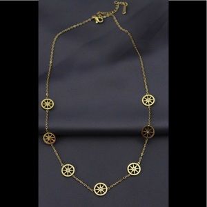 Women's gold steel necklace with zircon gemstones.